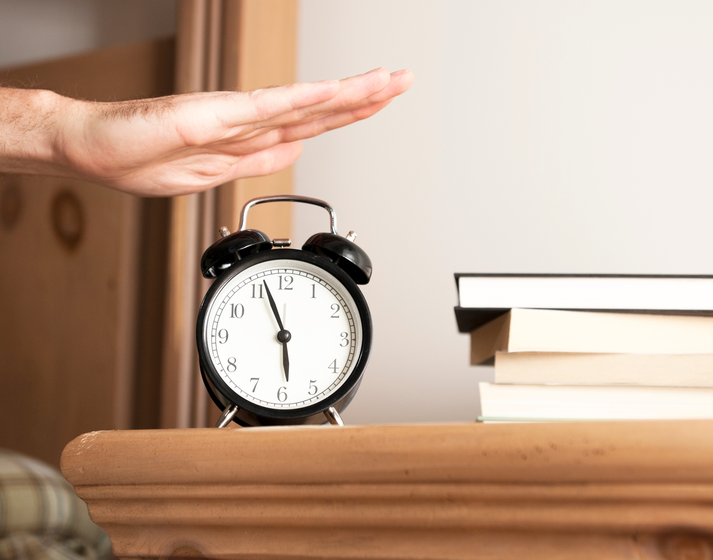 Man-series-closeup-image-of-alarm-clock-in-bedroom-000014977001_Large.jpg