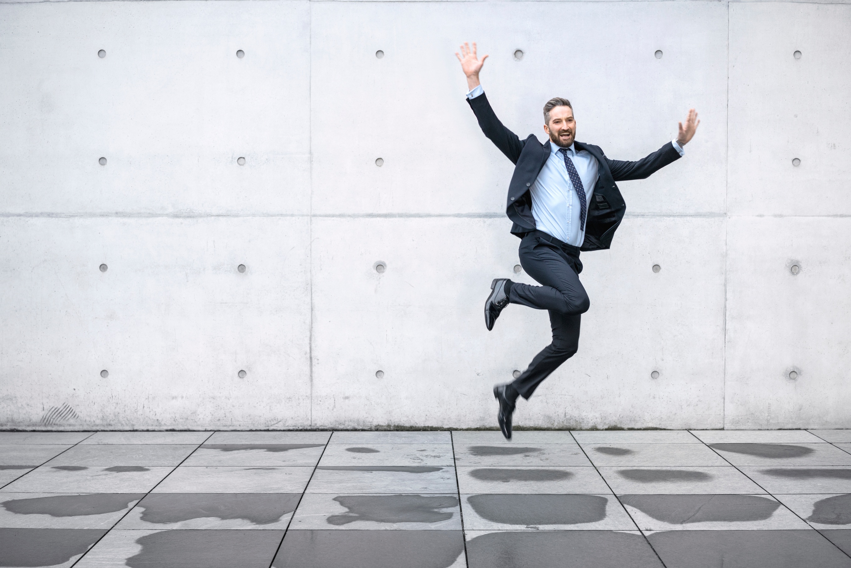happy-businessman-jumping-in-air-000096548261_Large.jpg